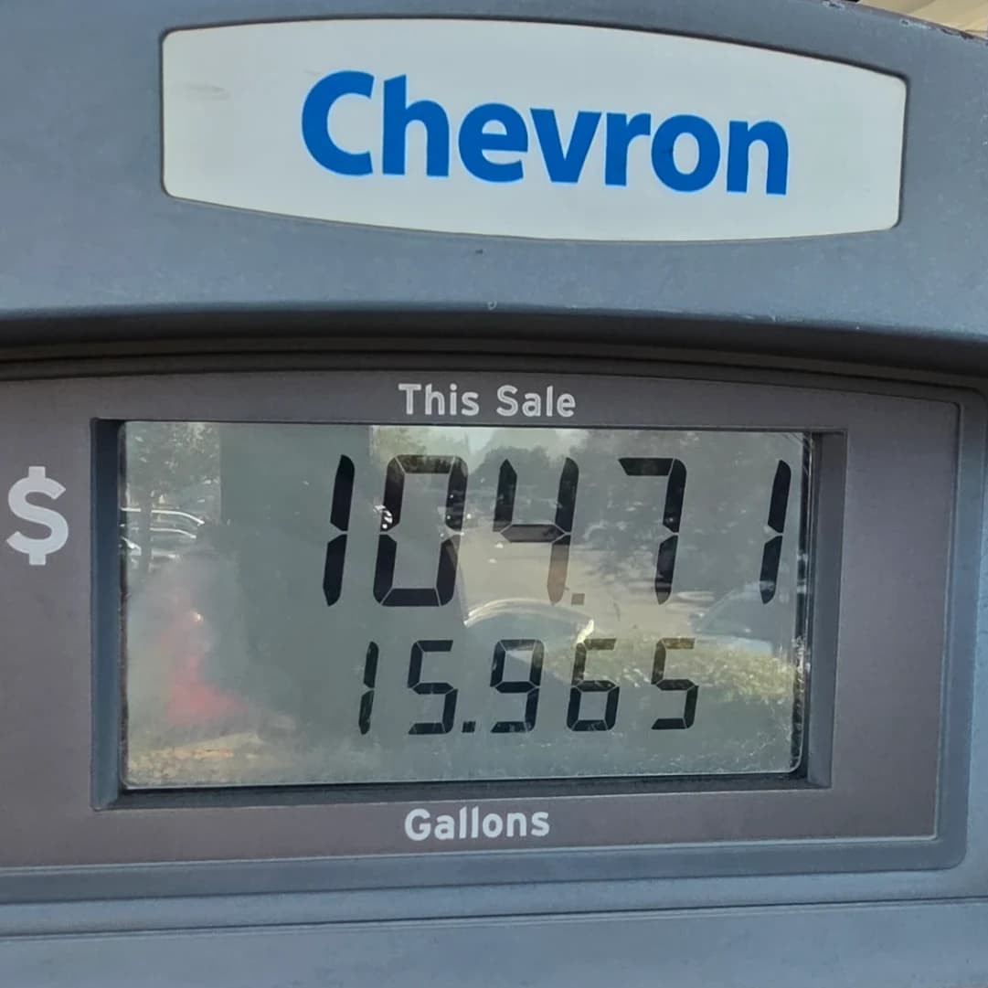 A close-up of a Chevron gas pump display.